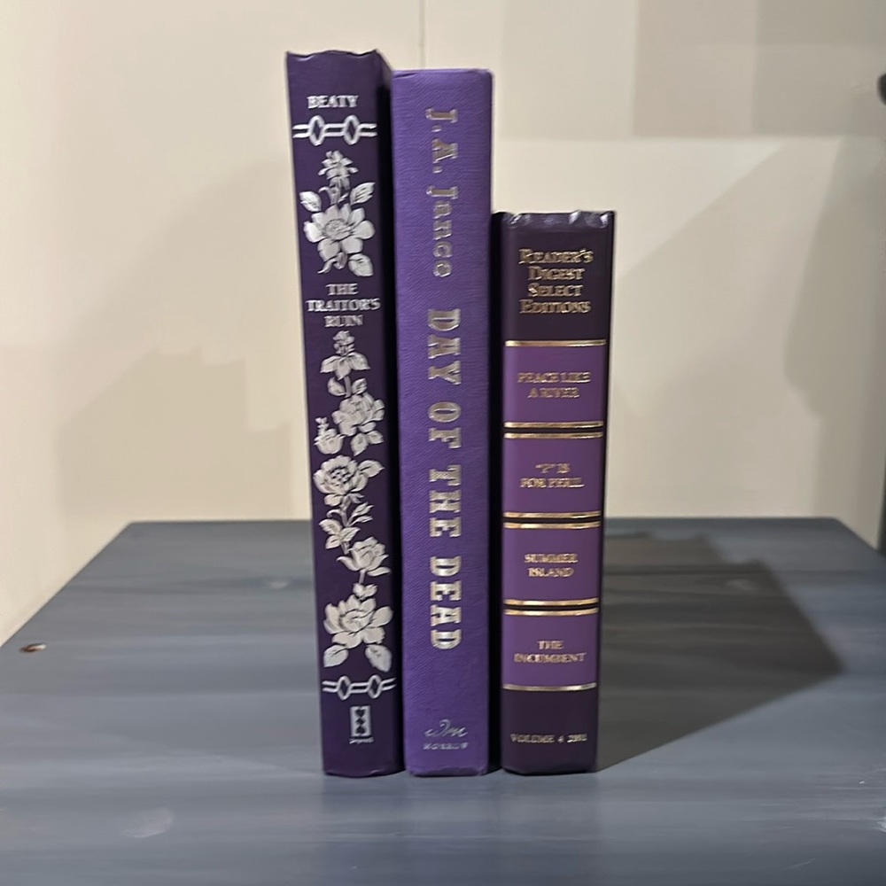 Set of Color-Coordinated Purple Hardback Books